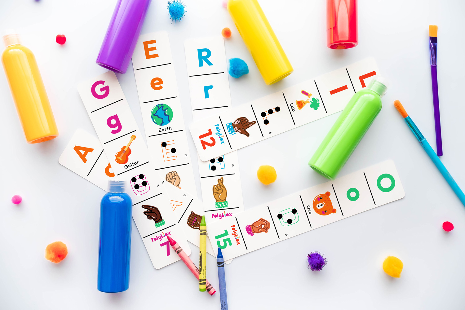 Inclusive ABC Cards surrounded by art supplies